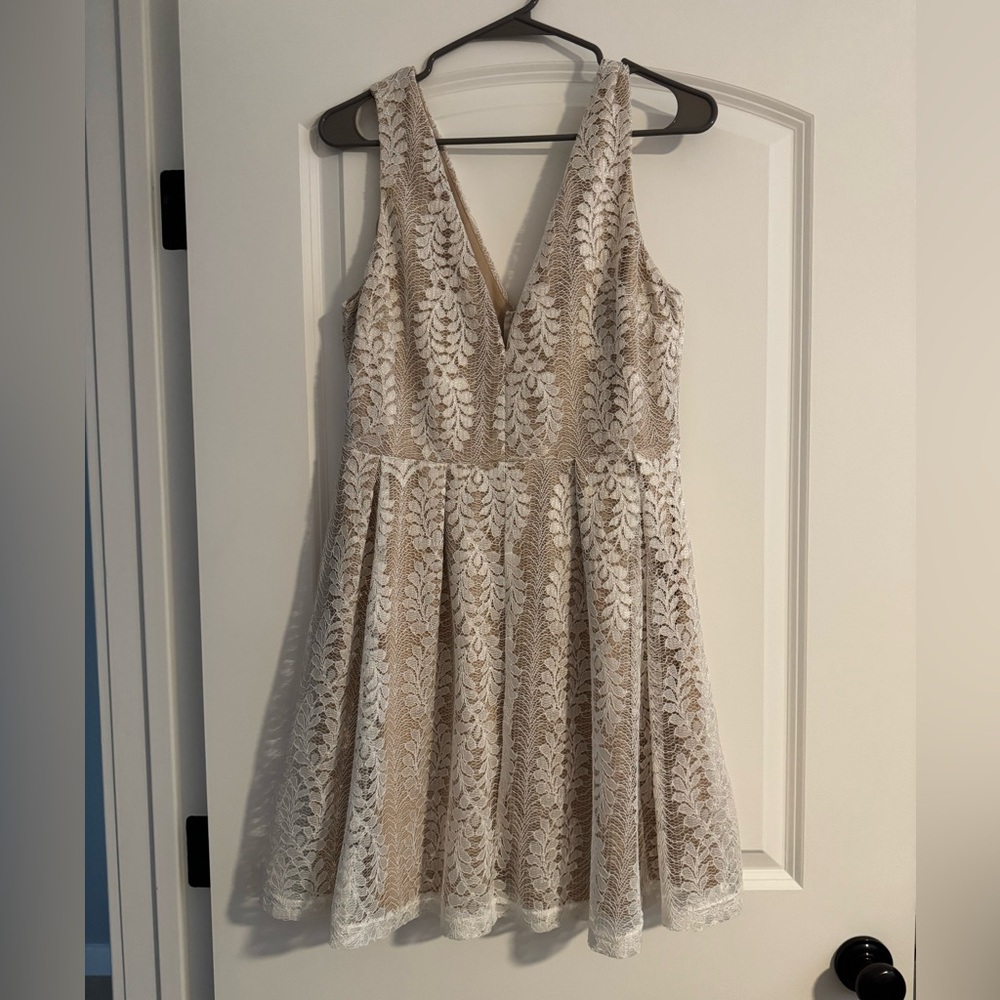 Large, worn once white lace above-the-knee dress with beautiful nude lining!